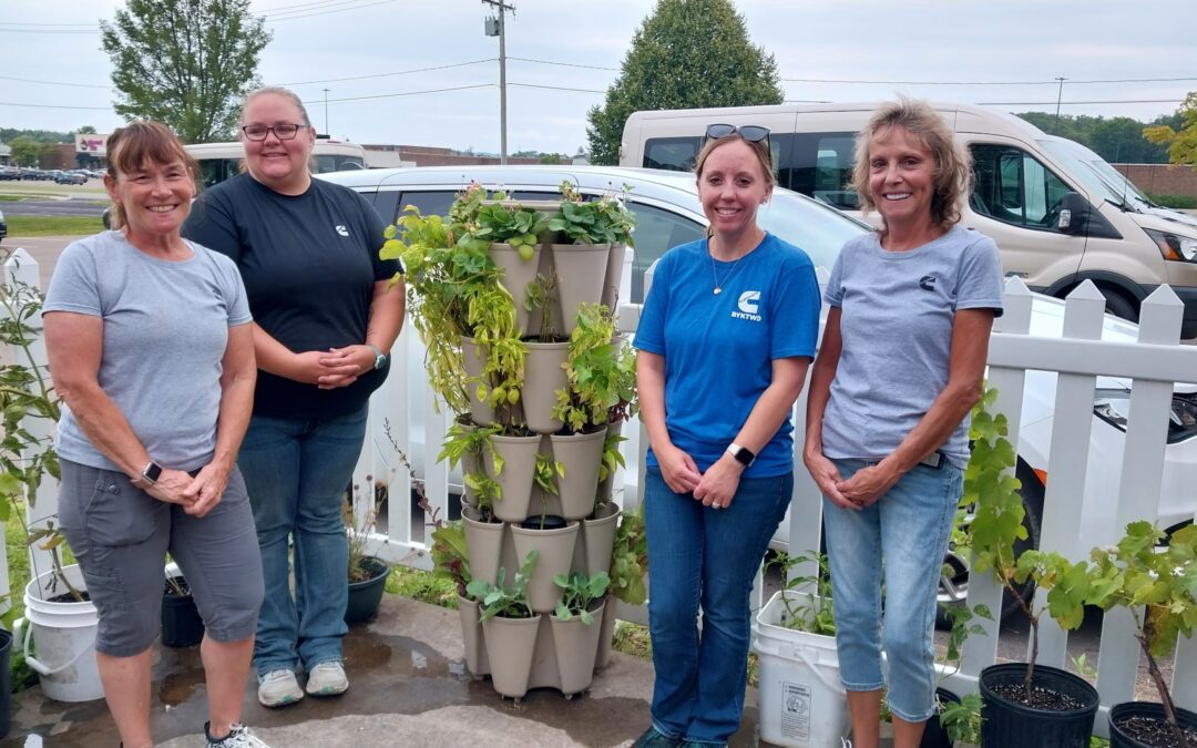 Blossoming Partnerships: Cummins Engine Volunteers Help Transform Aspire of WNY’s Beautiful Blooms Garden!
